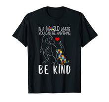 Load image into Gallery viewer, In A World Where You Can Be Anything Be Kind Dinosaur TShirt
