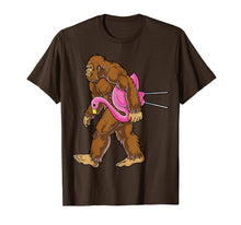 Load image into Gallery viewer, Bigfoot Carrying Lawn Flamingo T Shirt Funny Sasquatch Tees
