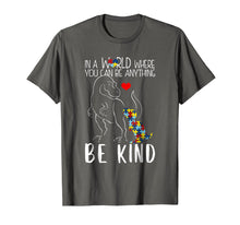 Load image into Gallery viewer, In A World Where You Can Be Anything Be Kind Dinosaur TShirt

